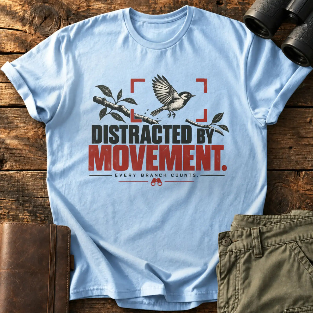 Distracted by Movement. Tee — Light Blue