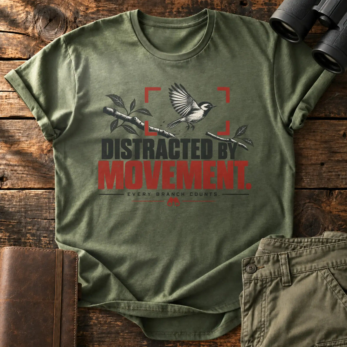 Distracted by Movement. Tee — Military Green
