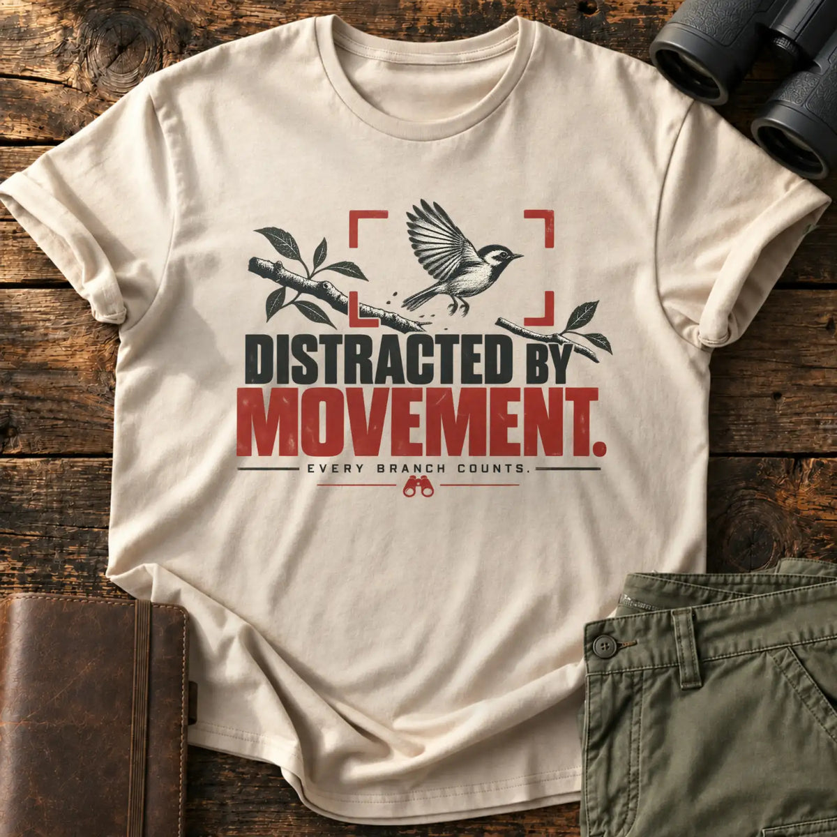 Distracted by Movement. Tee — Sand